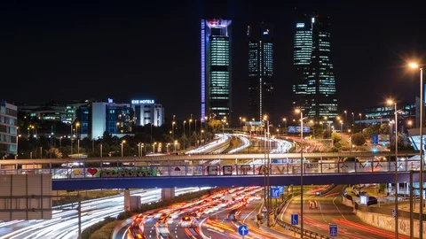 Time lapse in 4K about traffic in Madrid near the four towers Stock Footage 129842807