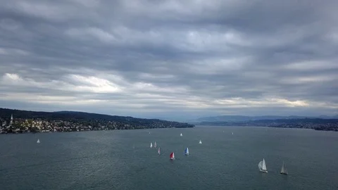 Time lapse of 4K Aerial view of sailing boats on Luzern Lake, in Switzerland. Stock Footage 113608415