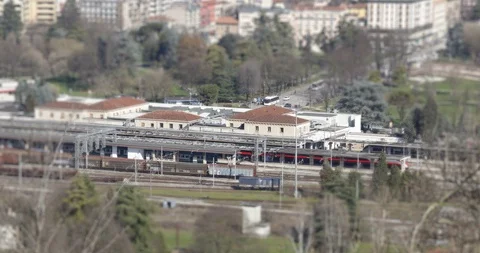 Time lapse 4k and tilt shift italian train station traffic Video stock 87739207