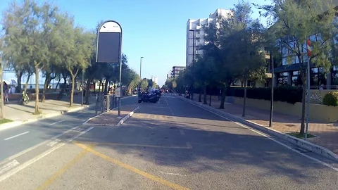 Time lapse 4k the coastal road busy with cars and scooters Stock Footage 95043636