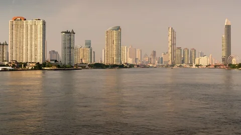 Time lapse 4K During the evening, waterfront skyscraper in the heart of Bangkok Stock Footage 107599984