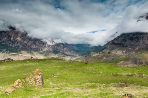 Time lapse 4K. The formation of clouds over alpine meadows. Stock Footage 50684514