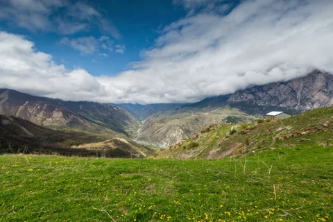 Time lapse 4K. The formation of clouds over alpine meadows. Stock Footage 50685294