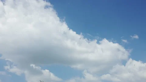 Time Lapse 4k Motion of White Clouds on Blue Sky background. Weather and Envi Stock Footage 148808853