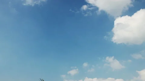 Time Lapse 4k Motion of White Clouds on Blue Sky background. Weather and Envi Stock Footage 148808867