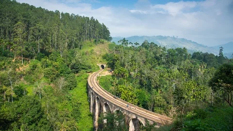 Time lapse 4k. Nine Arches Bridge, seen through the jungle, gardens and farms Stock Footage 119264865