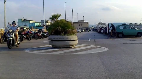 Time lapse 4k roundabout u-turn in a small marina Stock Footage 95043639