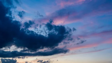 Time-lapse 4K sunset cloud moving away from the abstract colorful background Stock Footage 115354053