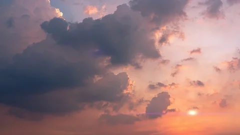 Time-lapse 4K sunset cloud moving away from the abstract colorful background Stock Footage 119674183