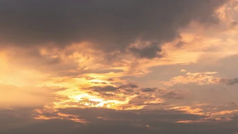 Time-lapse 4K sunset cloud moving away from the abstract colorful background Stock Footage 120744436