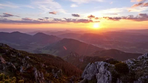 Time-lapse 4K, sunset over the mountain view from the top of the mountain on the Stock-Footage 265658222