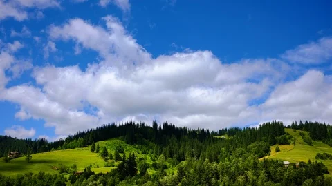 Time lapse 4K video of clouds moving at mountain valley Stock Footage 91930225
