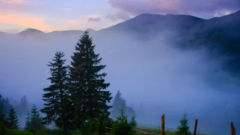 Time lapse 4K video of clouds and fog moving at mountain valley Video stock 91930246