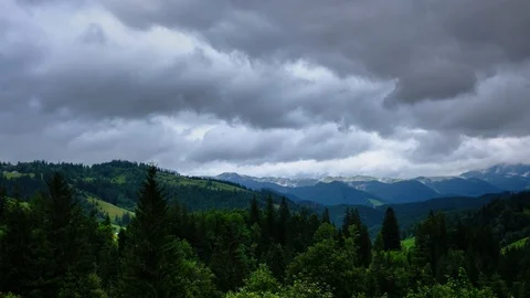 Time lapse 4K video of clouds and fog moving at mountain valley at cloudy rai Video stock 92239192