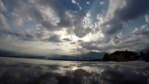Time lapse of 4K view of the white clouds over Brienz Lake in Switzerland Stock Footage 113612313