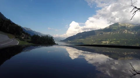 Time lapse of 4K view of the white clouds over Brienz Lake in Switzerland Stock Footage 113612334