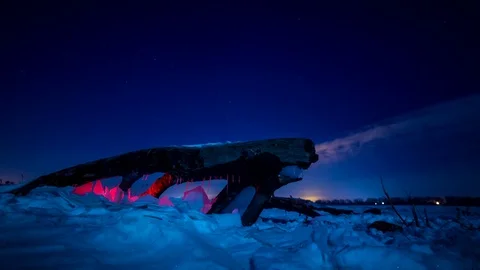 Time lapse 4K winter field starry sky fallen tree Stock Footage 72487458