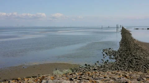 Time lapse, 50 times, high tide is coming, water level is rising, Juist island, Stock Footage 340926897
