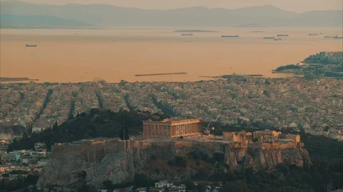 Time lapse. Acropolis with Parthenon. View through a frame with green plants Stock Footage 107589660