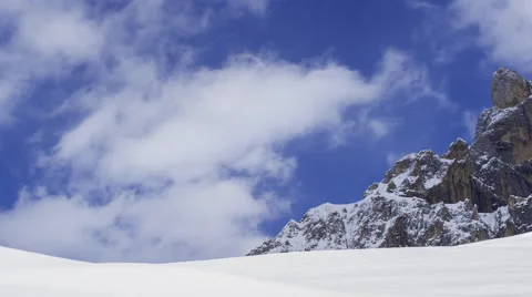 Time-lapse across virgin snow to mountain jutting out of the tundra. Stock Footage 68316464