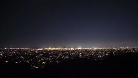 Time lapse of an active sprawling city at night in Tucson, AZ Stock Footage 99453133