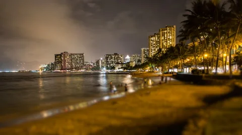 Time lapse of activity on Waikiki beach at night Stock Footage 50504246