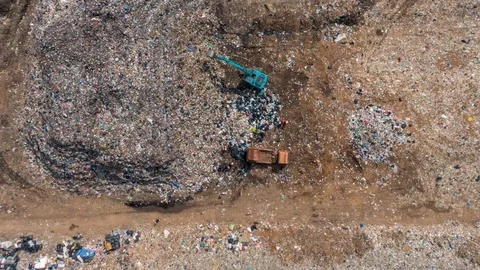 Time lapse Aerial, Garbage Dump, Unloads a Truck with Garbage. Stock-Footage 107866915