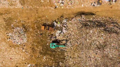 Time lapse Aerial, Garbage Dump, Unloads a Truck with Garbage. Stock-Footage 218376402