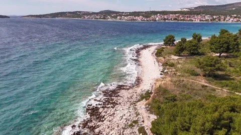 Time lapse aerial view of Adriatic coastline with pine trees in Croatia 動画素材 337183257
