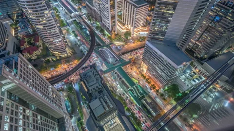 Time lapse Aerial view and top view of traffic on city streets in Bangkok. Stock Footage 133604146