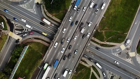 Time lapse aerial view of big road junction in city with cars, trucks, busses Stock Footage 112724378