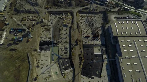 Time lapse, aerial view of building and working at construction site. Stock Footage 74130140