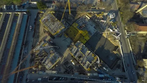 Time lapse, aerial view of building and working at construction site. Stock Footage 74130253