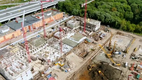 Time lapse aerial view of building a residential building in the big city. Video stock 137448853