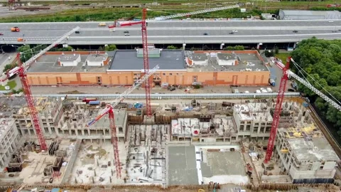 Time lapse aerial view of building a residential building in the big city. Video stock 137448868
