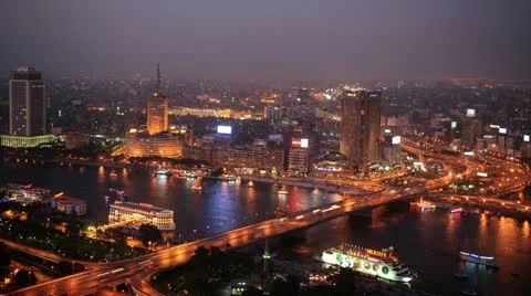 Time Lapse Aerial View of Cairo Skyline Car Traffic and Ferry Boat Dusk to Night Stock Footage 21778244