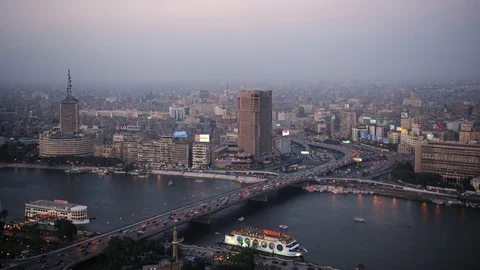 Time Lapse Aerial View of Cairo Skyline Car Traffic Ferryboat on Nile River Dusk Video stock 91238699