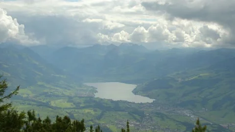 Time Lapse aerial view on clear-water lake in the Swiss Alps.  Video stock 152525243