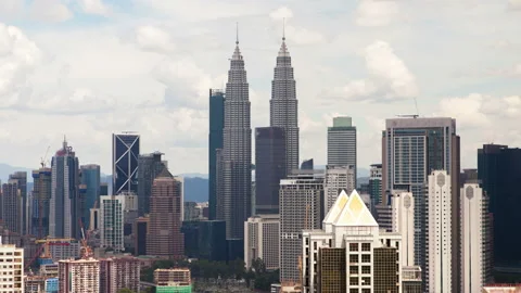 Time lapse: Aerial view day overlooking the Kuala Lumpur city skyline Stock Footage 115078358