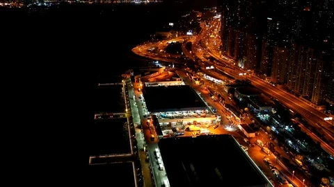 Time lapse of aerial view by drone at night In Hong Kong. Stock Footage 124717697