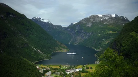 Time Lapse Aerial View Ferry Boat Docked in Geiranger Fjord Beautiful Landscape Stock Footage 104960728