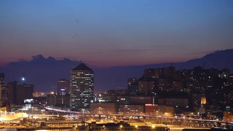 Time Lapse Aerial View of Genoa Skyline Cars Traffic on Freeway Dusk to Night Stock Footage 99842005