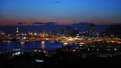 Time Lapse Aerial View of Genoa City Skyline Cars Traffic Highway Day to Night Stock Footage 105712902