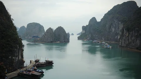 Time Lapse Aerial View of Ha Long Bay Islands Junk Boat at Sung Sot Grotto Cave Stock-Footage 102958742