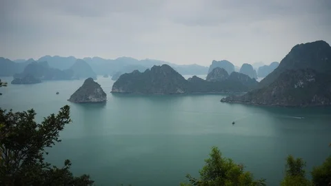 Time Lapse Aerial View of Islets in Ha Long Bay Vietnam with Vivid Green Hills Stock Footage 102958519