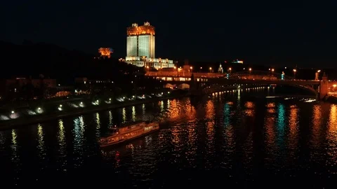 Time-lapse. Aerial view of Kremlin at night in Moscow, Russia. Touristic boats Stock Footage 79863203