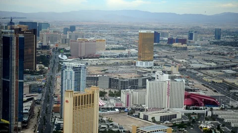 Time Lapse Aerial View of Las Vegas Skyline Casino Building Car Traffic on Strip Stock Footage 106128935