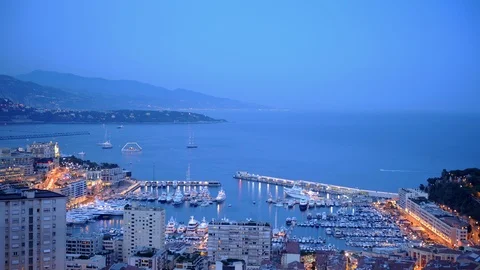Time Lapse Aerial View Monte Carlo La Condamine Iconic City Port Dusk to Night Stock Footage 99040144