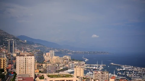 Time Lapse Aerial View of Monte Carlo Skyline Yachts Depart from Port Hercules Stock Footage 109278845