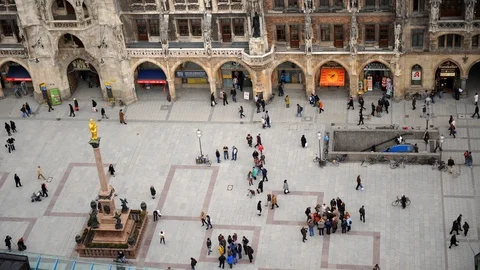 Time Lapse Aerial View of Munich with People Visit Crowded Marienplatz Landmark Video stock 104494906